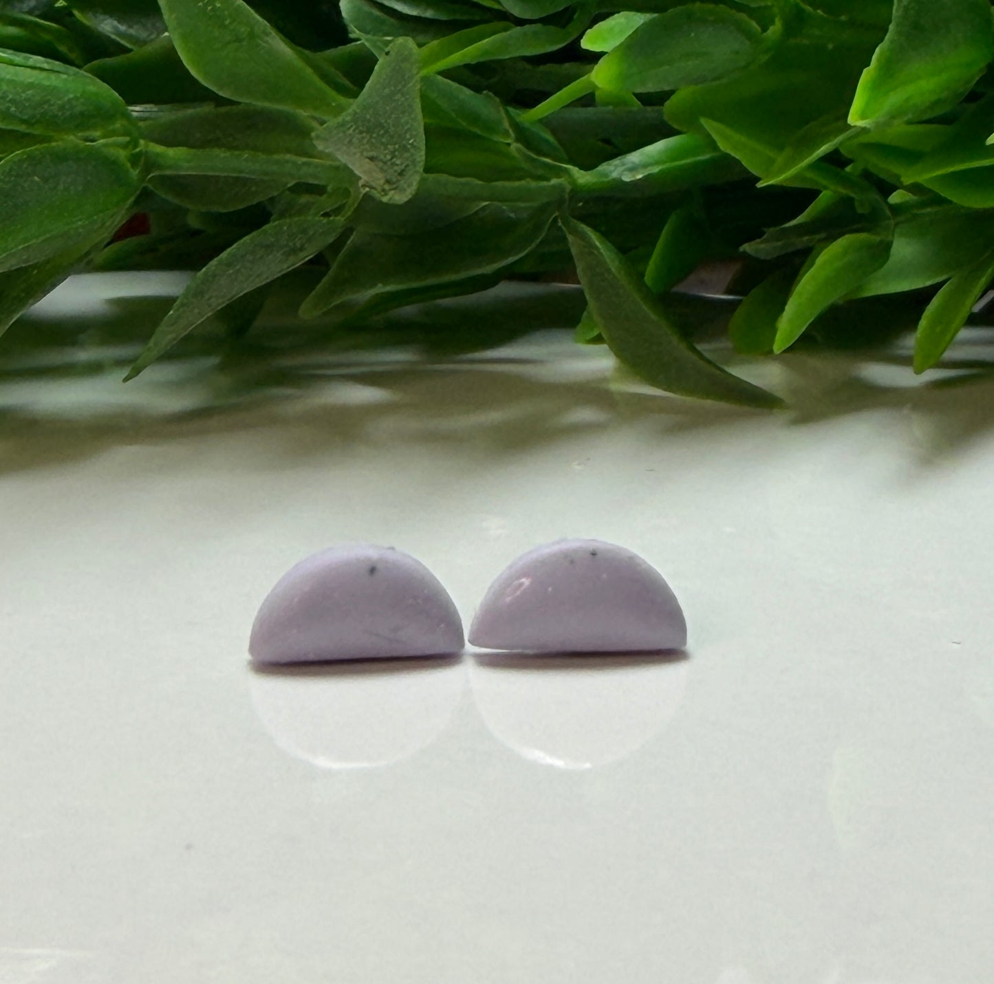 Tiny semi-circle studs